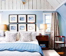 beautiful modern blue and white bedroom in attic