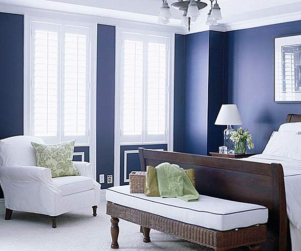 navy blue bedroom with white furniture
