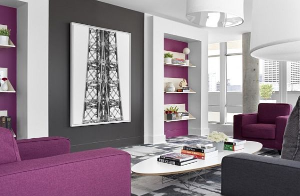 purple couch and chair in white and grey dining room