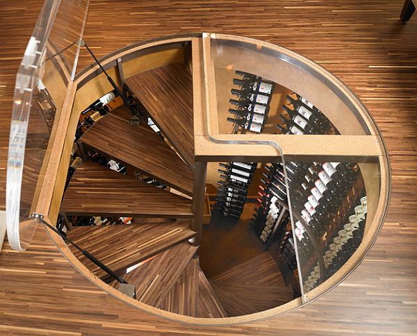 spiral staircase leading to a fancy wine cellar / by ie: Designs