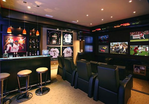 Sports themed home bar clubbed with the perfect entertainment center