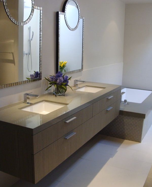 Tantalizing bathroom design with beautiful mirrors and brown floating 