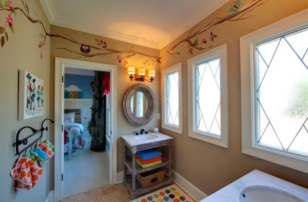An open shelf and a cute towel rack stand out in this cute kids bathroom space