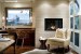 Modern guestroom design with small fireplace