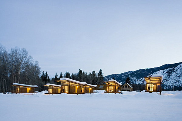 Rolling huts in the snowy landscape