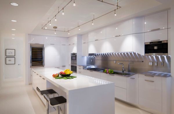 Cool track lighting installation above the kitchen island 