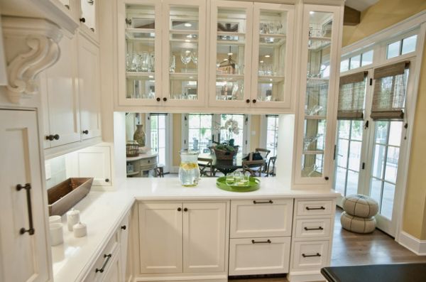 Glass front kitchen cabinets set in a wooden frame
