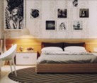 Modern furnishings and chic artwork for the girls' bedroom