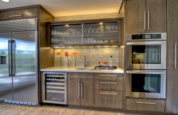 Reeded glass cabinet in the center offers textural contrast in this kitchen space