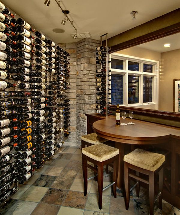 Wine cellar with compact seating area that comes in handy for a quick