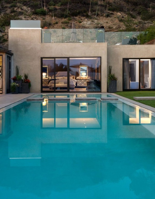 bedroom with pool view