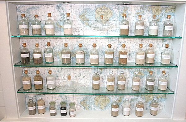 Collection bottles against a wallpaper backdrop
