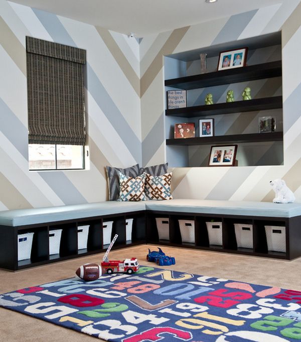 Custom built bench in the playroom offers plenty of storage space for toys