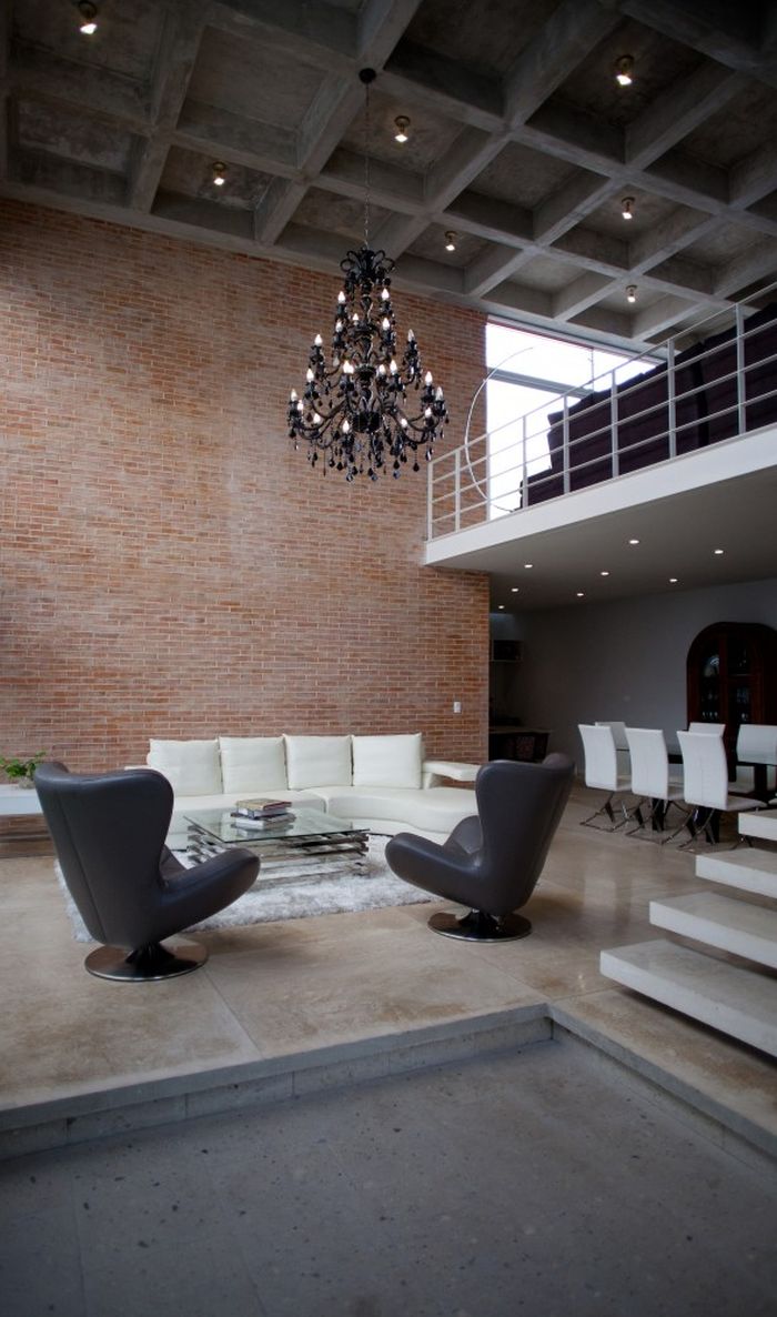 Spacious living room with exposed brick