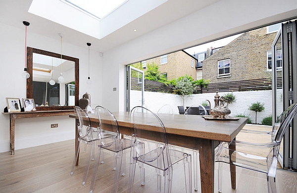 Combine a wooden table with the Ghost Chairs to blend contrasting 