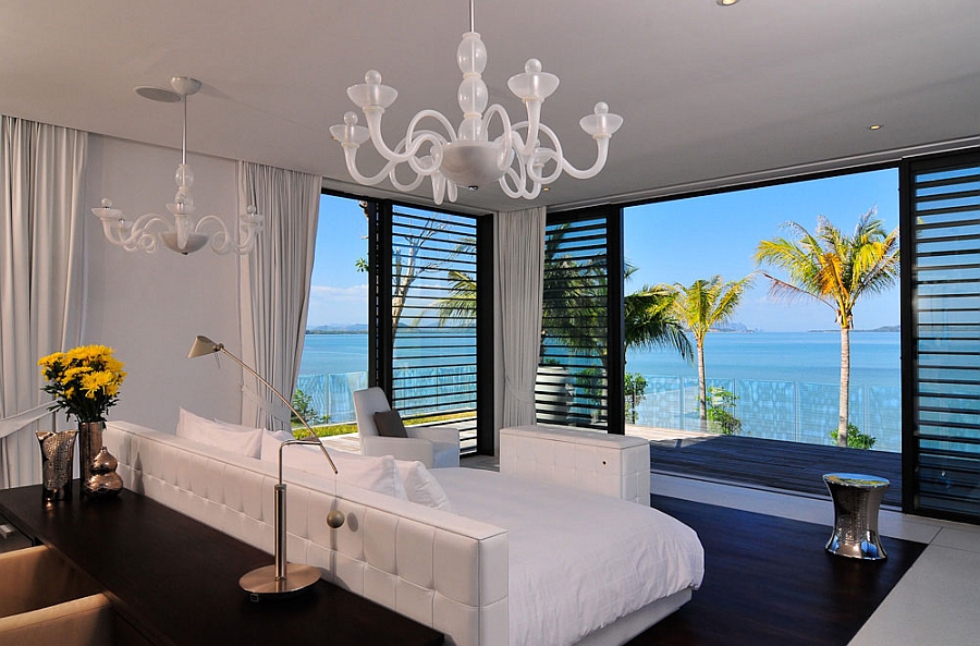 Contemporary bedroom with sweeping sea views