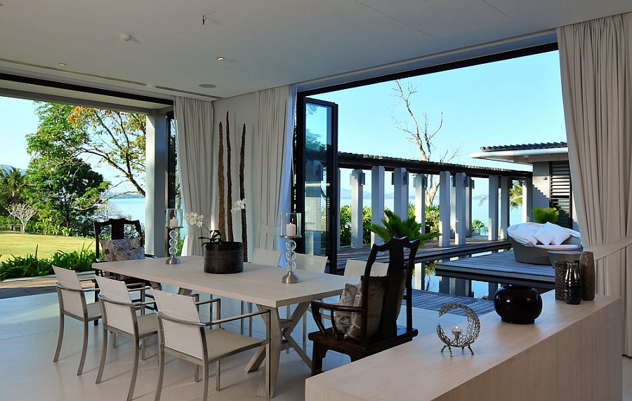 Stylish modern dining space with sea views
