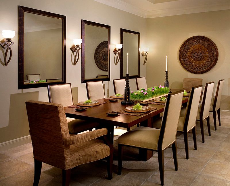dining room with wall sconces
