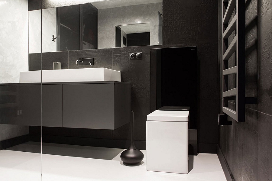 Floating vanity in grey and a sink in white paint a refined picture in the bath