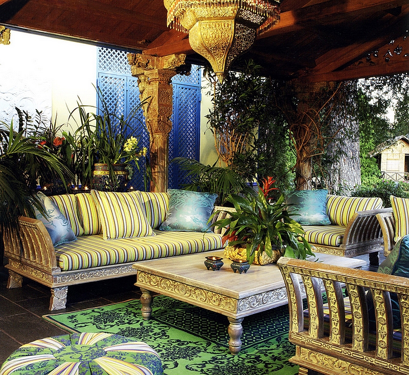 Intricately carved decor and brilliant lighting shape this stunning moroccan patio