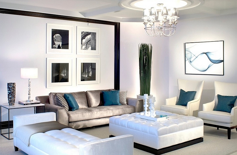 Lavish black and white living room with posh blue accents