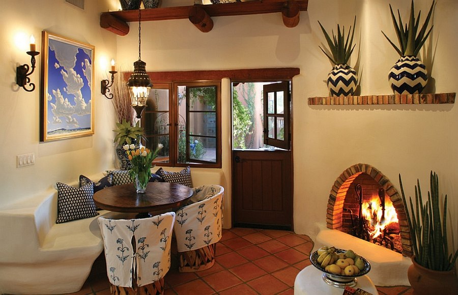 Mediterranean style dining room with cozy corner fireplace ...