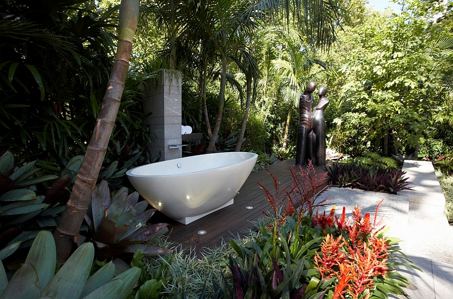 Outdoor bathroom with shower and bathtub [Design: Dean Herald-Rolling Stone Landscapes]
