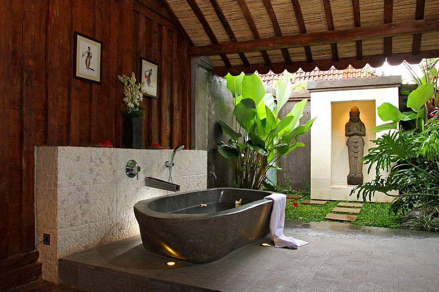 Semi outdoor bathroom with its own Zen nook [Design: Iwan Sastrawiguna Interior Design]
