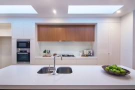Beautiful modern kitchen in white with plenty of natural ventilation