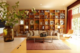 Bookshelf blends in with the Midcentury style of the room
