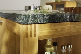 Closer look at the kitchen island in wood and stone