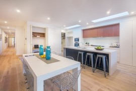 Concealed home work space and pantry next to the kitchen