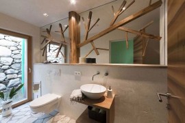 Exquisite use of wood inside the master bathroom