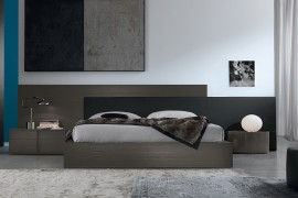 Interesting use of contrasting nightstands with common finish in the bedroom