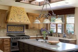 Lovely skylight blends in with the style and theme of the room