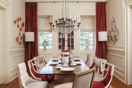 Lovely use of drapes and rug to usher in some red