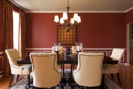 Red dining room walls with a touch of white