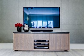 Sleek wooden TV Cabinet tucks away the entertainment center