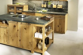 Solid wood doors for the cabinets help tuck away any mess