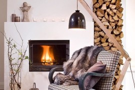 Stacked wood shapes a brilliant backdrop for the cozy reading spot