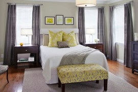 Stylish bench at the foot of the bed in yellow