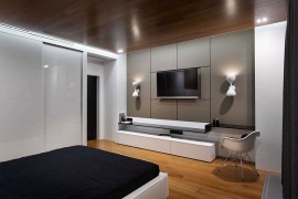 Wall-mounted entertainment unit for the bedroom