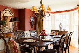 Wallcovering in red brings both color and texture to the dining space