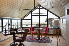 Antique nautical pieces and unique design shape this ingenious home office