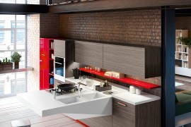 Board kitchen design combines warmth of wood with red accents