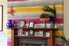 Create a bright and funky accent addition with colorful wallpaper