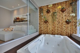 Fabulous bamboo wall acts as the perfect backdrop for a tranquil, soothing dip