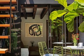 Large retractable skylight offers access to the roof garden