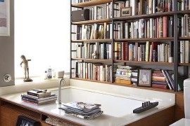 Library set into the bathroom walls at the home of writer Michael Cunningham
