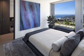Lovely art work seems to complement the distant ocean making up the view!